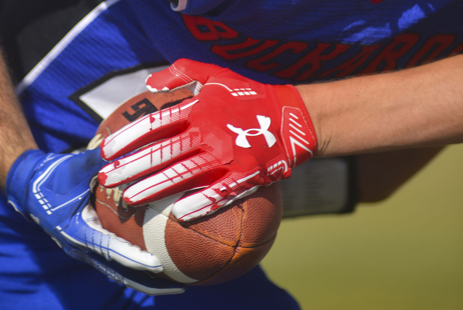 Nathan Largent holds onto the ball as a Hulett defender